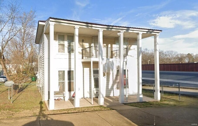 view of outdoor structure with fence
