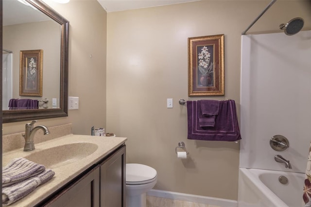 bathroom with toilet, vanity, shower / bath combo with shower curtain, and baseboards