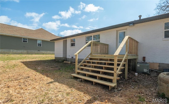 514 W Missouri St, Bloomfield, MO 63825 - rear view of house with brick siding, crawl space, and central AC