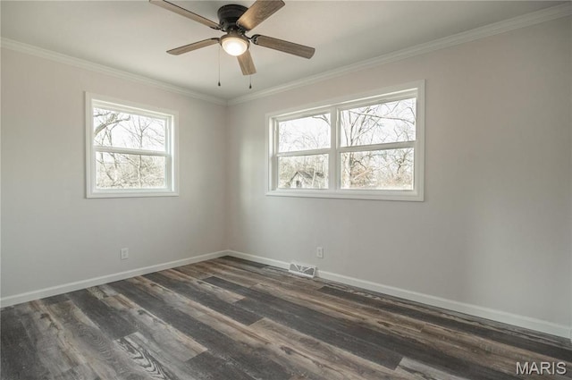514 W Missouri St, Bloomfield, MO 63825 - spare room featuring ornamental molding, dark wood-style flooring, baseboards, and ceiling fan