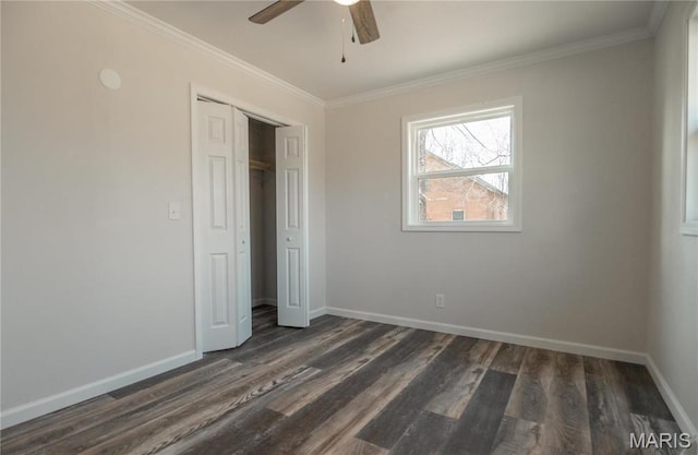 514 W Missouri St, Bloomfield, MO 63825 - unfurnished bedroom with dark wood finished floors, ornamental molding, baseboards, a closet, and a ceiling fan