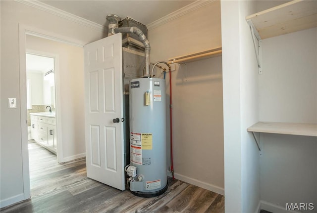 514 W Missouri St, Bloomfield, MO 63825 - utilities with water heater and a sink