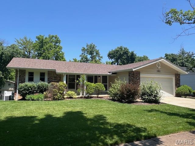 1211 Dorne Dr, Manchester, MO 63021 - ranch-style home with a garage, a front yard, and driveway