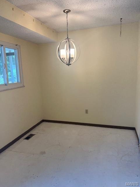 1211 Dorne Dr, Manchester, MO 63021 - spare room featuring a textured ceiling