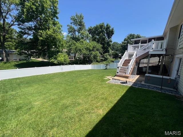 1211 Dorne Dr, Manchester, MO 63021 - view of yard featuring stairs, a sunroom, and a wooden deck