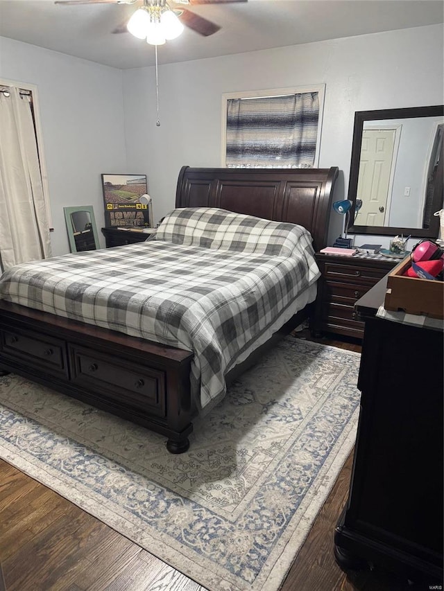 bedroom featuring wood finished floors and ceiling fan