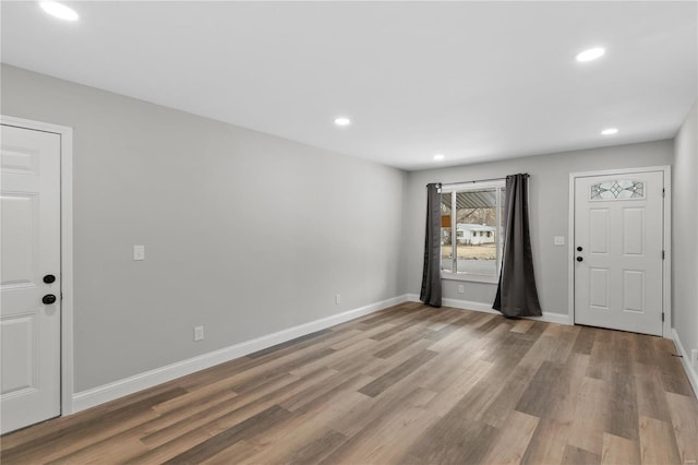 1686 Mowbry Ln, Saint Louis, MO 63136 - entryway with recessed lighting, light wood-style flooring, and baseboards
