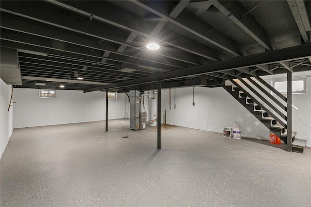 1686 Mowbry Ln, Saint Louis, MO 63136 - below grade area with heating unit, stairs, and water heater