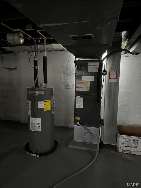 7119 Lexington Ave, Normandy, MO 63121 - utilities featuring water heater and heating unit