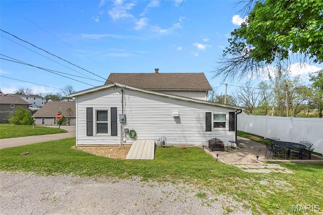 rear view of house with a patio area