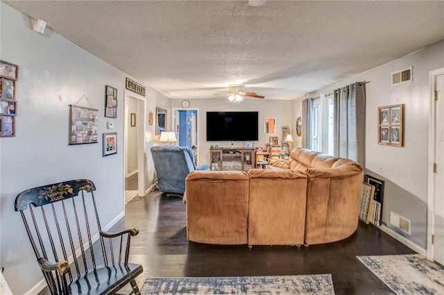 302 E Bay St, Pleasant Hill, IL 62366 - living room with a textured ceiling, ceiling fan, baseboards, and dark wood-style floors