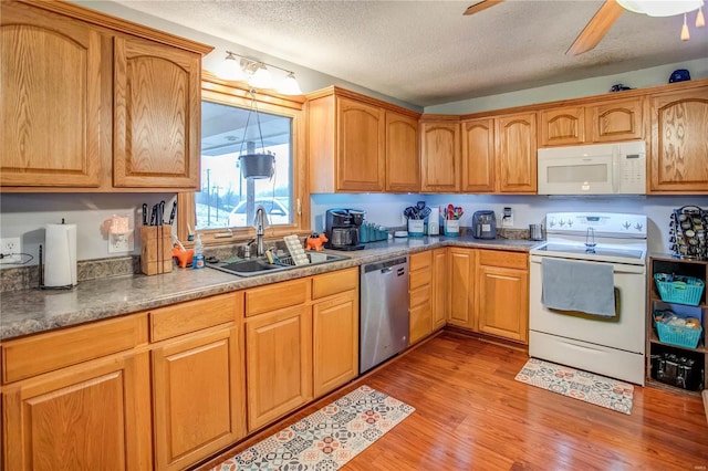 302 E Bay St, Pleasant Hill, IL 62366 - kitchen with white appliances, a sink, light wood-style floors, a textured ceiling, and ceiling fan