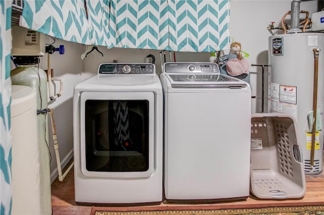 302 E Bay St, Pleasant Hill, IL 62366 - laundry area with separate washer and dryer, gas water heater, and wood finished floors