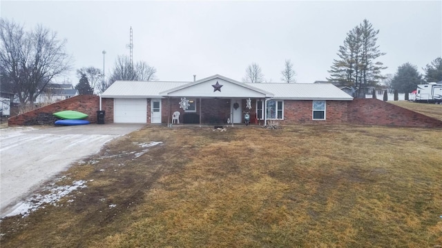 302 E Bay St, Pleasant Hill, IL 62366 - single story home featuring covered porch, an attached garage, driveway, metal roof, and a front lawn