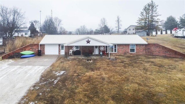302 E Bay St, Pleasant Hill, IL 62366 - ranch-style home featuring driveway, a garage, covered porch, metal roof, and brick siding