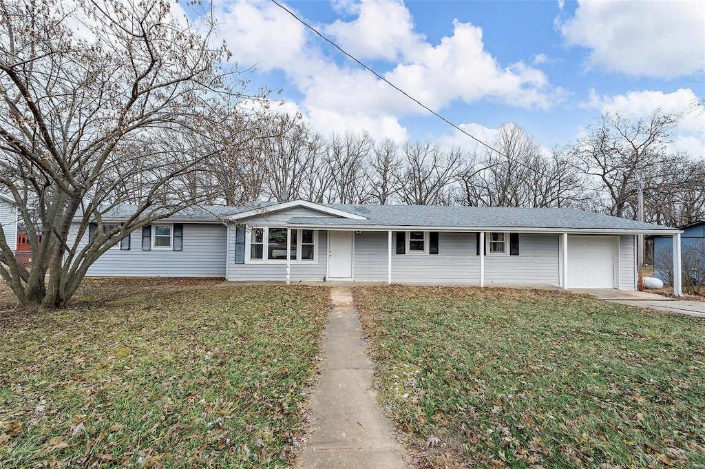 127 Davis Rd, Troy, MO 63379 - ranch-style house featuring an attached garage, a front lawn, concrete driveway, and a shingled roof