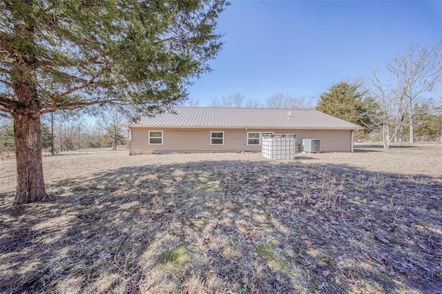 31950 County Road 6250, Edgar Springs, MO 65462 - back of property featuring central AC and metal roof