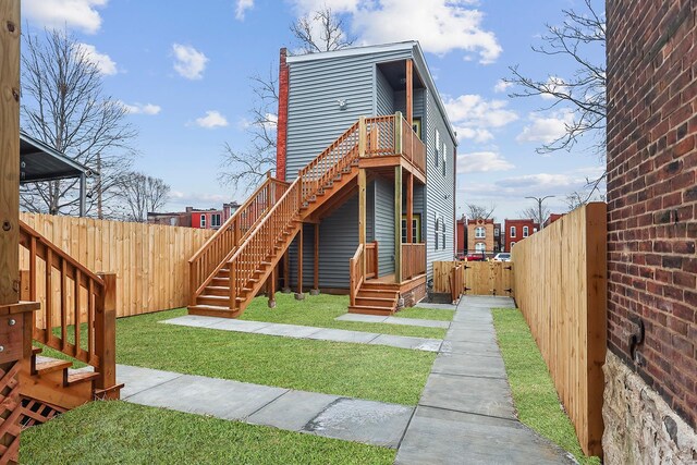 3330 Iowa Ave, Saint Louis, MO 63118 - rear view of house featuring stairs