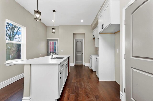 3330 Iowa Ave, Saint Louis, MO 63118 - kitchen featuring a sink, dark wood-style floors, white cabinetry, light countertops, and recessed lighting