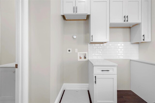 3330 Iowa Ave, Saint Louis, MO 63118 - laundry area featuring hookup for an electric dryer, hookup for a washing machine, and cabinet space