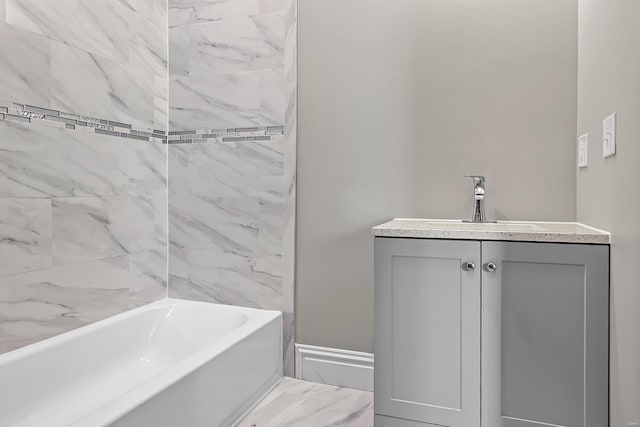 3330 Iowa Ave, Saint Louis, MO 63118 - bathroom with marble finish flooring, vanity, and baseboards