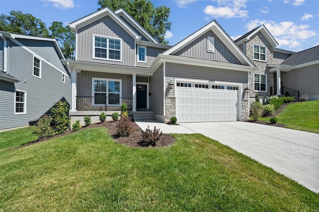 craftsman inspired home featuring board and batten siding, stone siding, a porch, concrete driveway, and an attached garage