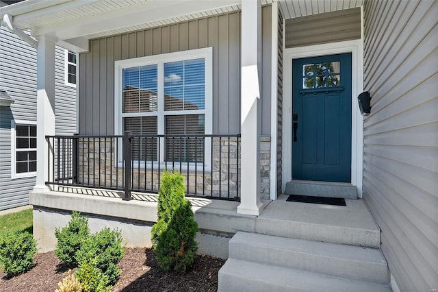 doorway to property with a porch
