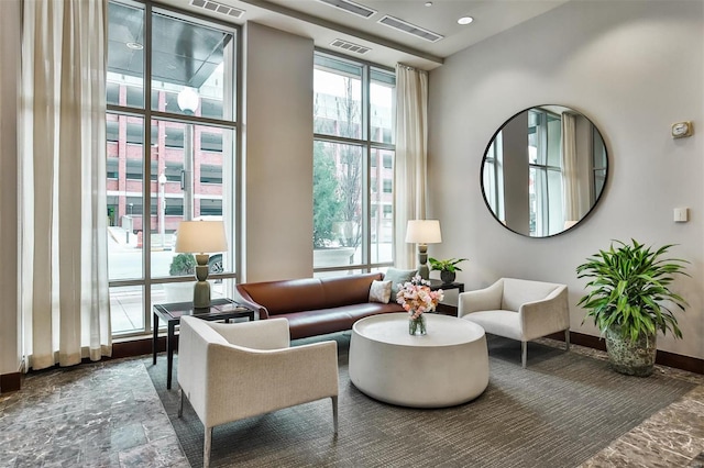 4909 Laclede Ave Unit 1401, Saint Louis, MO 63108 - common area with a wall of windows