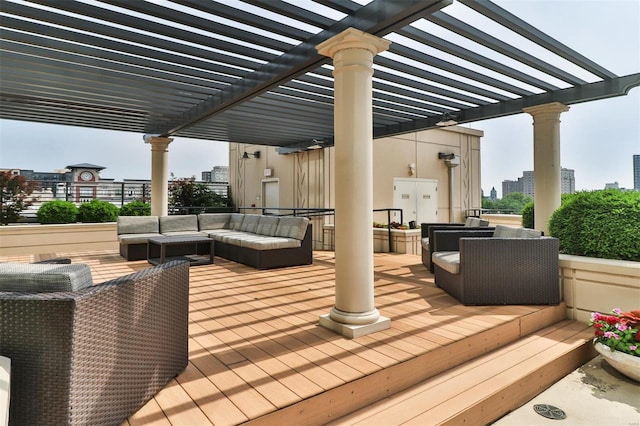 4909 Laclede Ave Unit 1401, Saint Louis, MO 63108 - wooden terrace featuring a pergola, an outdoor hangout area, and a city view