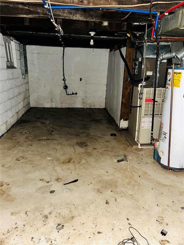 10719 Thorpe Ave, Saint Louis, MO 63114 - unfinished below grade area with gas water heater and heating unit