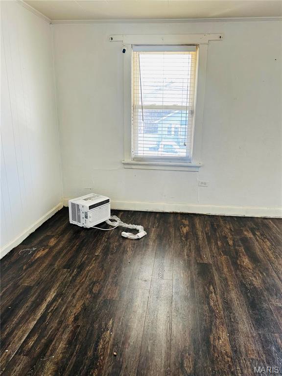 10719 Thorpe Ave, Saint Louis, MO 63114 - spare room with hardwood / wood-style flooring and ornamental molding