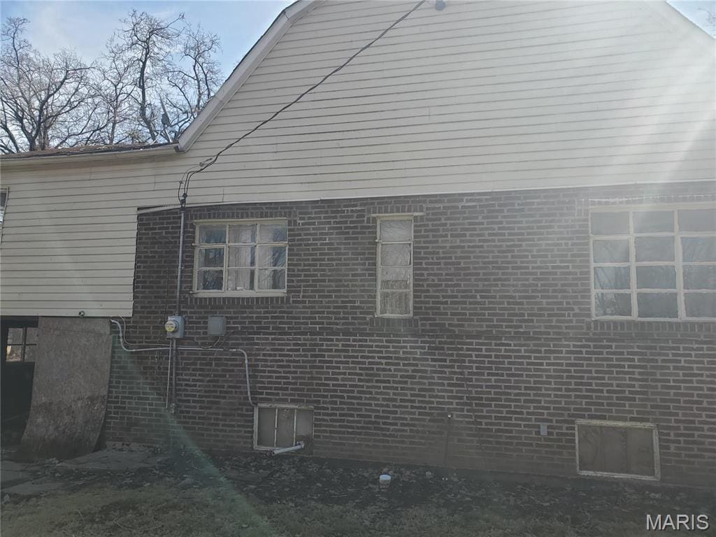 45 Jarvis Pl, Cahokia, IL 62207 - view of side of home with brick siding