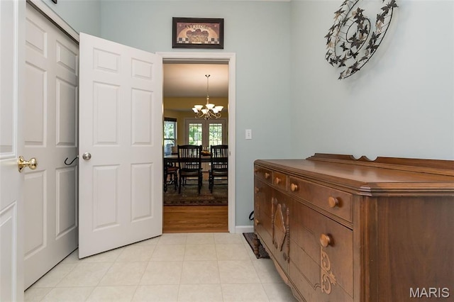 885 Morgan Rdg, High Ridge, MO 63049 - corridor featuring a chandelier and light tile patterned floors