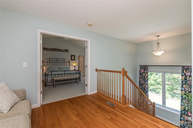 885 Morgan Rdg, High Ridge, MO 63049 - corridor with an upstairs landing and wood finished floors