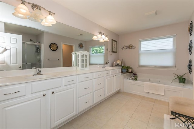 885 Morgan Rdg, High Ridge, MO 63049 - bathroom featuring tile patterned floors, a bath, double vanity, a stall shower, and a chandelier