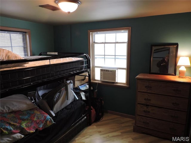 17 Martone St, Elsberry, MO 63343 - bedroom featuring cooling unit and light wood-type flooring