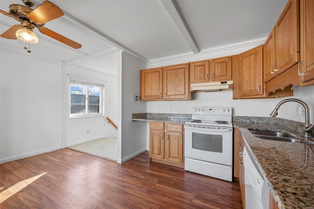 kitchen with white appliances, under cabinet range hood, a sink, a ceiling fan, and light stone countertops