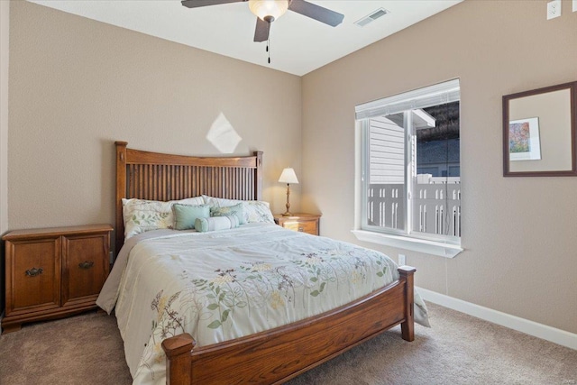 18051 Blue Anchor Dr Unit 522, Gravois Mills, MO 65037 - carpeted bedroom with baseboards and a ceiling fan