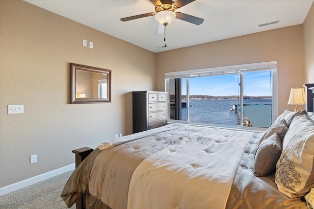 18051 Blue Anchor Dr Unit 522, Gravois Mills, MO 65037 - bedroom with carpet floors, access to exterior, baseboards, ceiling fan, and a water view