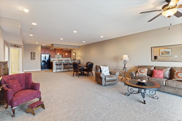 18051 Blue Anchor Dr Unit 522, Gravois Mills, MO 65037 - living area featuring light colored carpet, a ceiling fan, baseboards, and recessed lighting