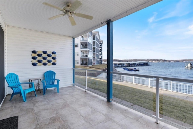 18051 Blue Anchor Dr Unit 522, Gravois Mills, MO 65037 - sunroom with a water view and ceiling fan