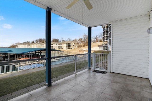 18051 Blue Anchor Dr Unit 522, Gravois Mills, MO 65037 - balcony featuring a ceiling fan and a residential view