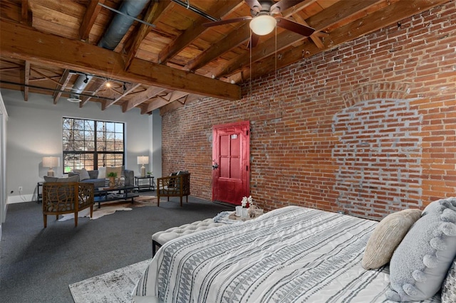 carpeted bedroom featuring beamed ceiling, brick wall, wooden ceiling, baseboards, and a high ceiling