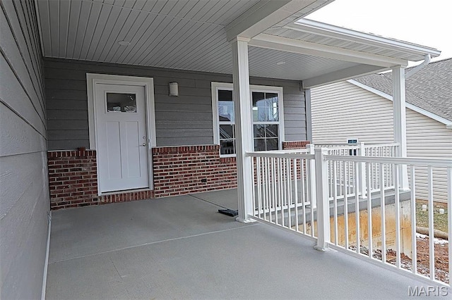 40 Butterfield, Farmington, MO 63640 - view of exterior entry with brick siding and covered porch