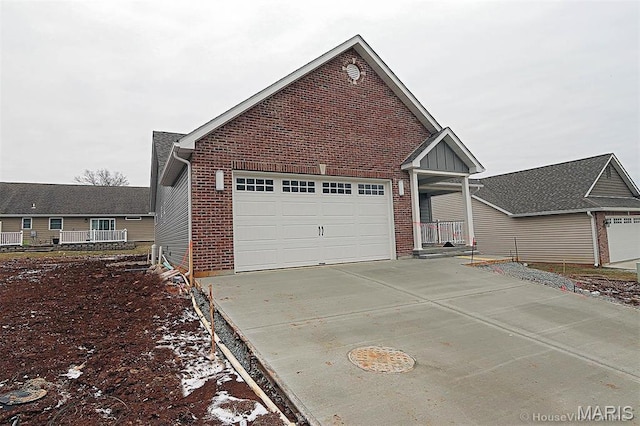 40 Butterfield, Farmington, MO 63640 - view of front facade with brick siding, concrete driveway, and a garage