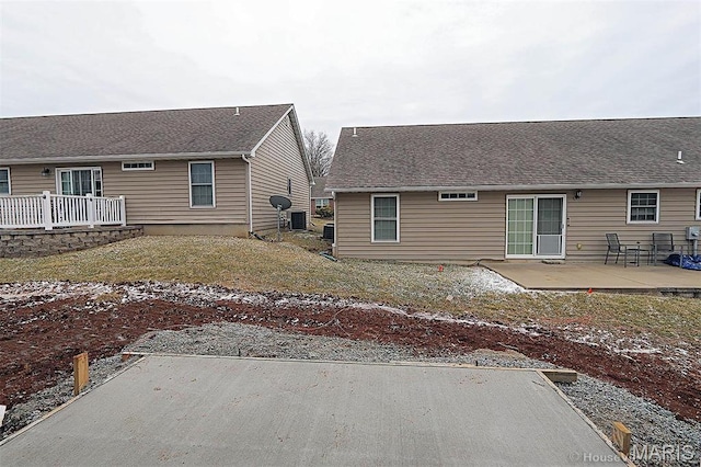 40 Butterfield, Farmington, MO 63640 - back of property featuring a patio and central AC