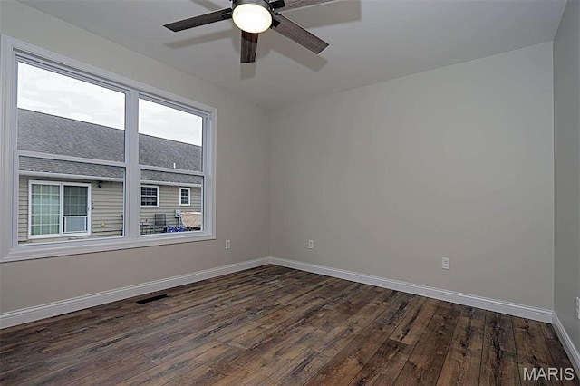 40 Butterfield, Farmington, MO 63640 - empty room featuring dark wood finished floors, baseboards, and ceiling fan
