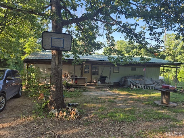 169 Clover Ln, Bourbon, MO 65441 - rear view of property featuring a metal roof