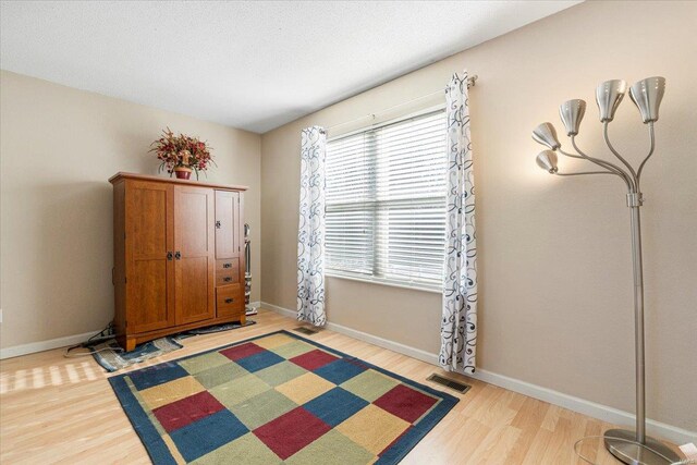 2537 Castle Pines Dr, Imperial, MO 63052 - bedroom with wood finished floors and baseboards
