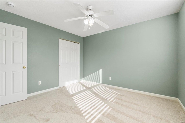 2537 Castle Pines Dr, Imperial, MO 63052 - unfurnished bedroom featuring carpet flooring, a closet, and baseboards